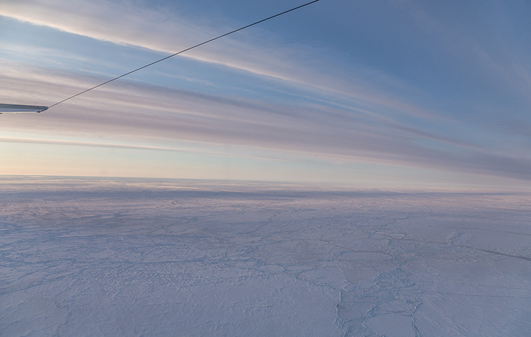 Snow-covered pack sea ice north of Greenland.