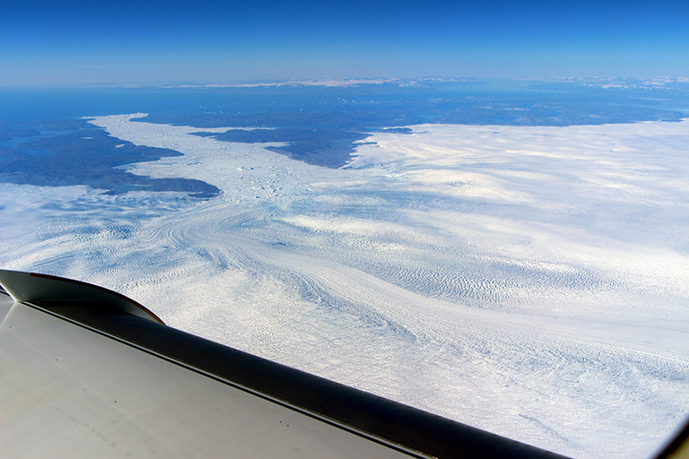 A wider view of the calving front of Jakobshavn from the window of a NASA research plane.