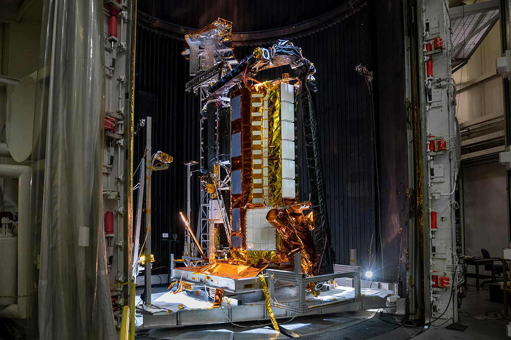 Part of the NISAR satellite rests in a thermal vacuum chamber – meant to mimic the conditions found in space – at NASA's Jet Propulsion Laboratory in August 2020.