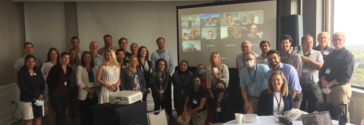 N-SLCT SavannahMembers of the NASA Sea Level Change Team, in-person and virtual, take a moment for a group photo at a meeting in Savannah, Georgia.