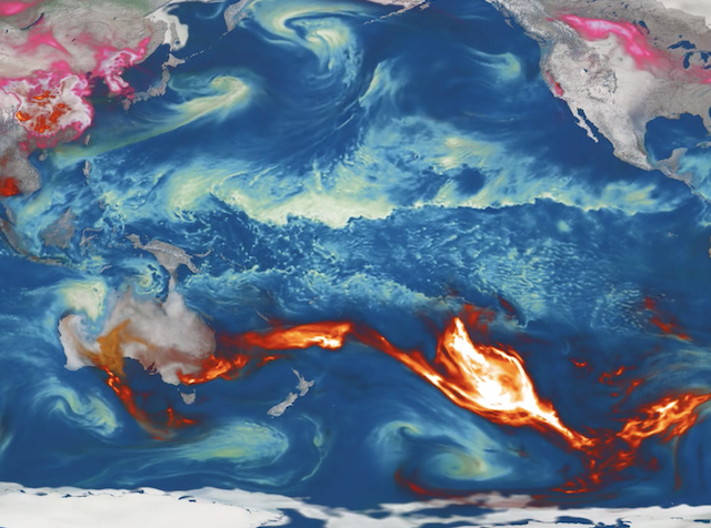 A rectangular image centers on the continents of North and South America, Australia visible to the lower left, with red and orange swirls extending out across the South Pacific from Australia toward the lower west coast of South America; these represent aerosol plumes from Australian wildfires.