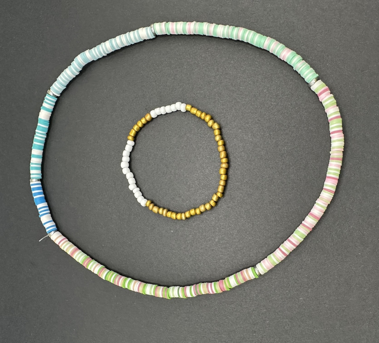 Sea level bracelets use different colors and sizes to represent time frames and locations. Image credit: Ali Rellinger