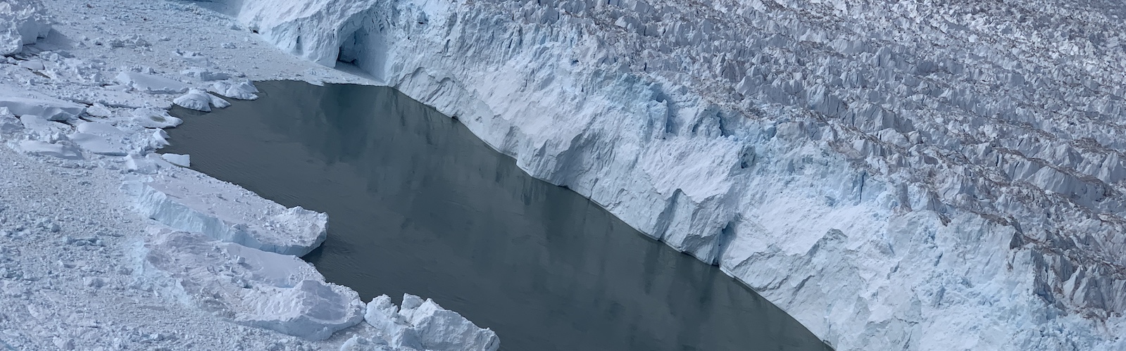 slide 2 - Lake formed in melting glacier