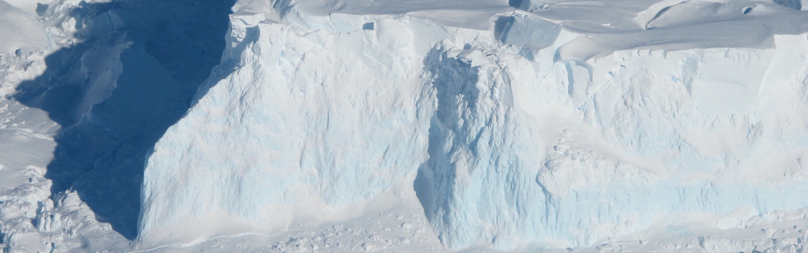 slide 1 - Photo of Thwaites Glacier in Antarctica.