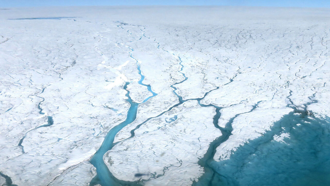 Photo of meltwater rivers on Greenland Ice Sheet